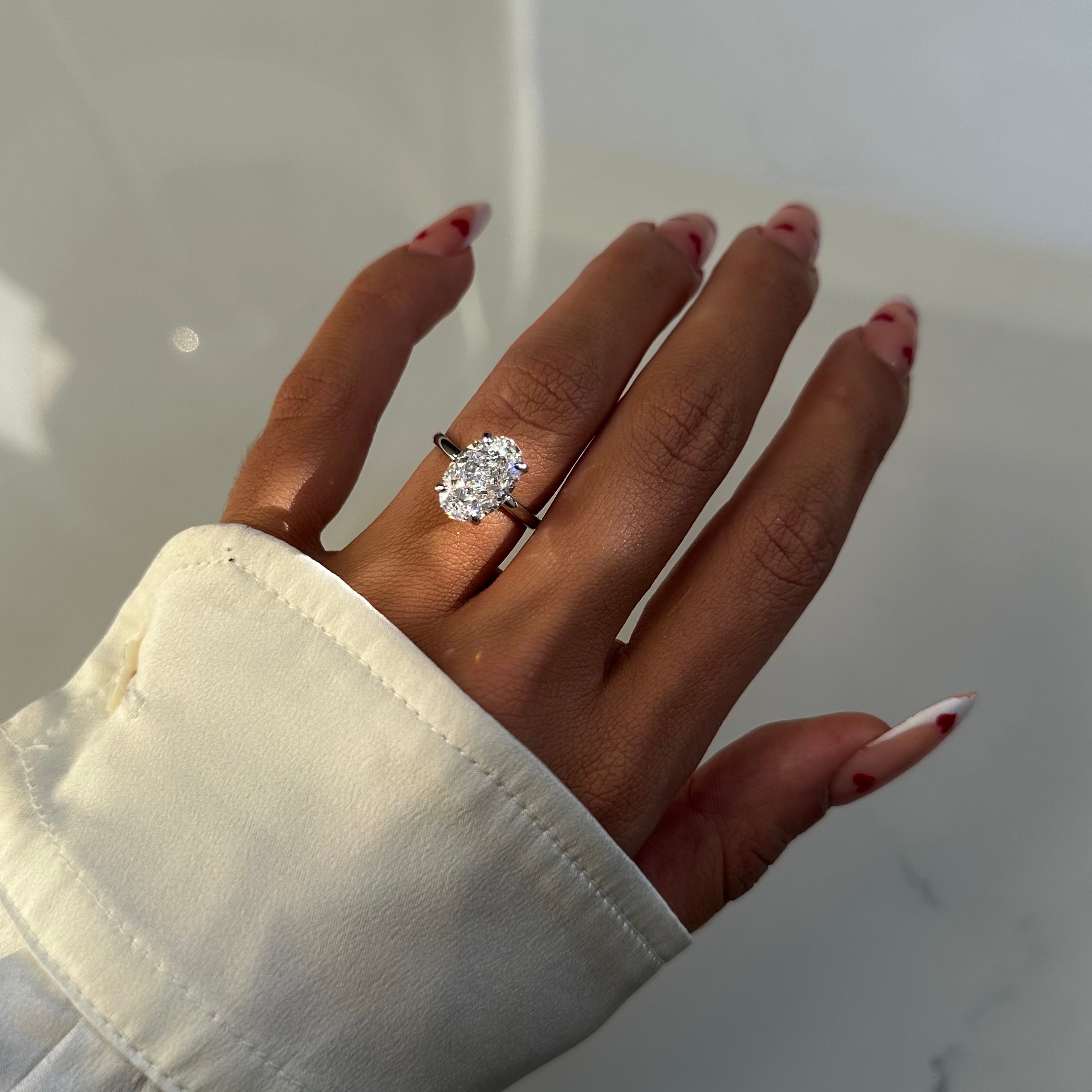 CRUSHED ICE OVAL CUT RING