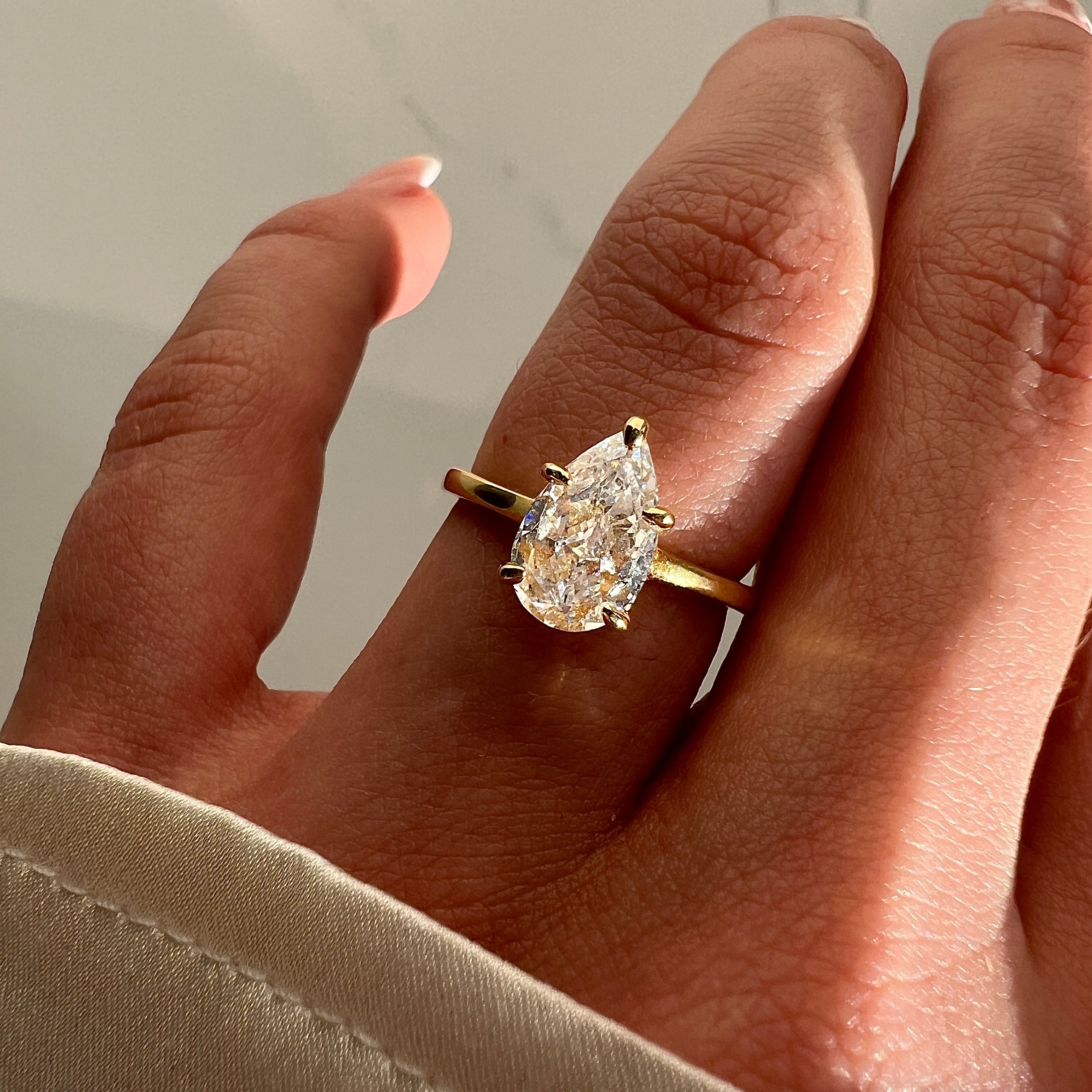 PEAR CUT SOLITAIRE RING